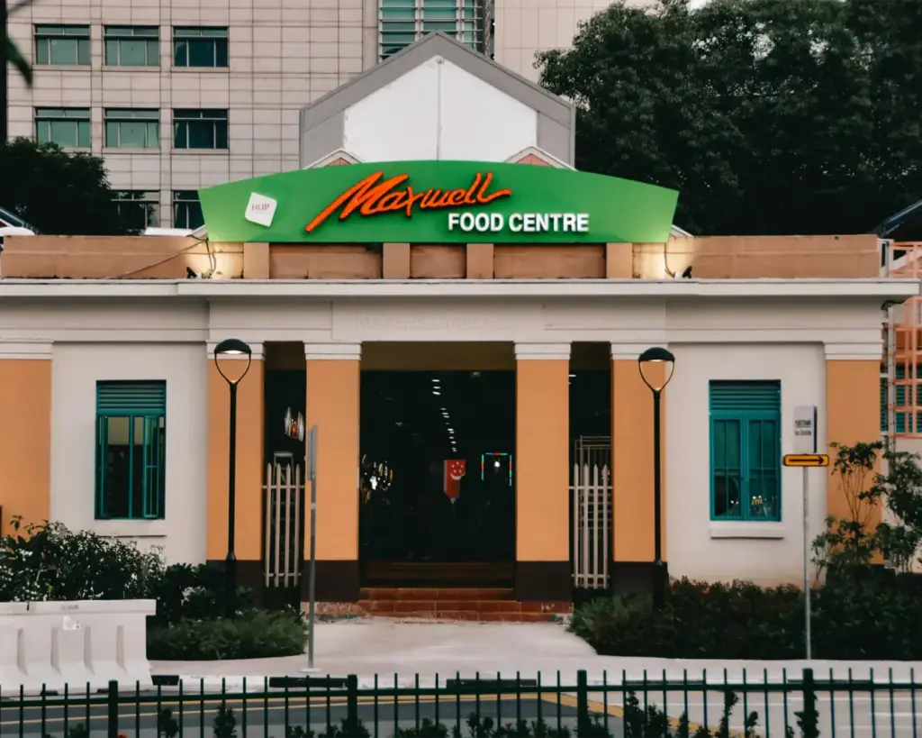 The exterior of Maxwell Food Centre in Singapore, a well-known hawker centre famous for its diverse local food stalls and vibrant street food culture.
